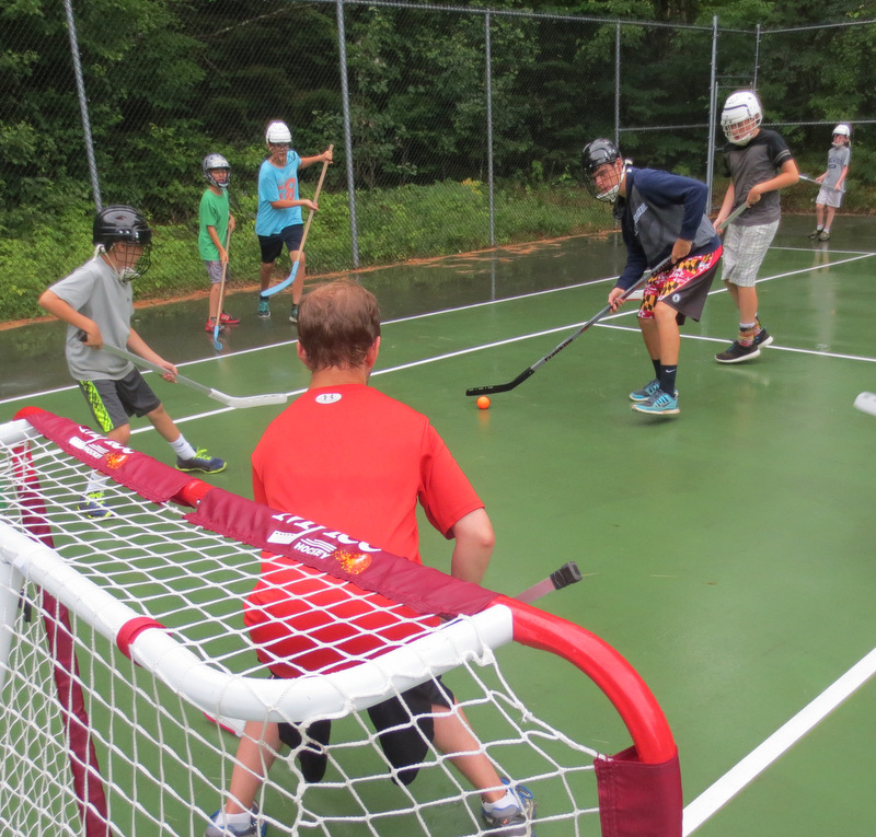 Floor hockey drew quite a few stick slappers to the tennis courts.