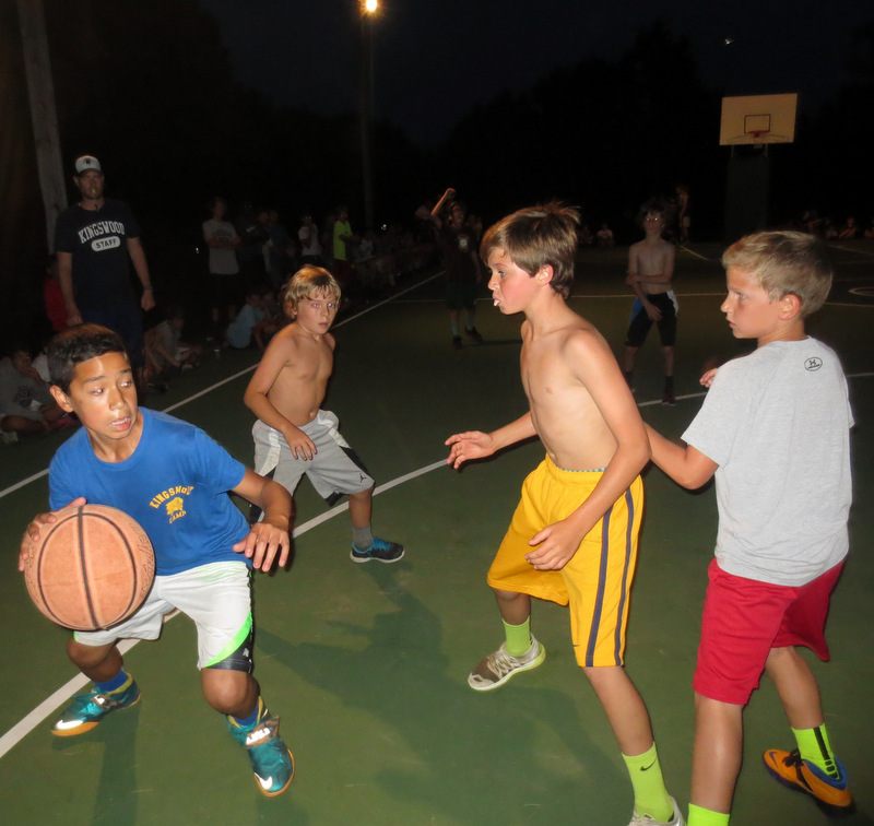 Playing hoops in front of the entire camp